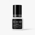 bottle of ionik lash adhesive